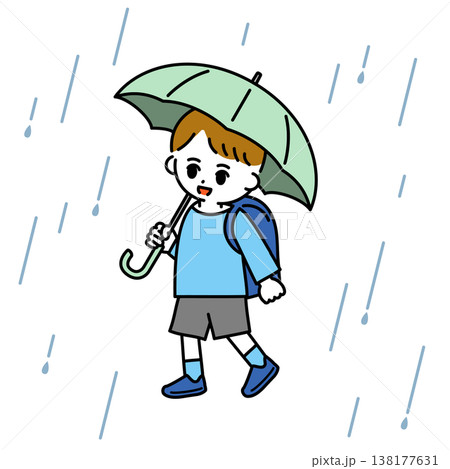 雨傘をさして登校する男の子 138177631
