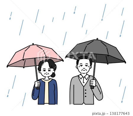 雨傘をさすシニア男女 雨傘をさすシニア男女 138177643