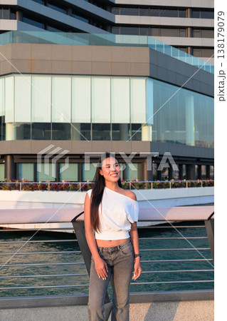 Smiling Thai Woman Tourist at Hong Kong Victoria Harbour 138179079