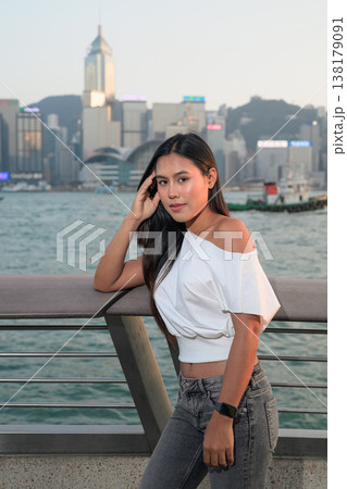 Smiling Thai Woman Tourist at Hong Kong Victoria Harbour 138179091