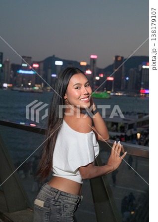 Thai Woman Tourist at Hong Kong Night Skyline Thai Woman Tourist at Hong Kong Night Skyline 138179107