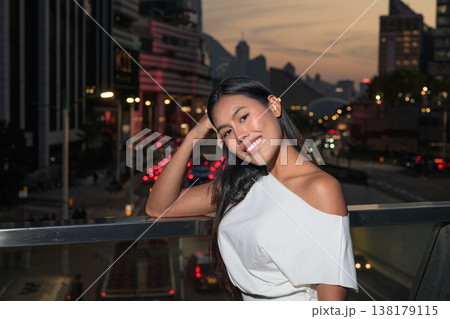 Thai Woman Tourist at Hong Kong Night Skyline 138179115