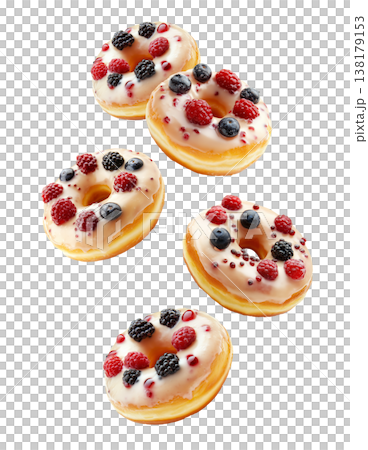 Multiple glazed donuts topped with blueberries and raspberries, on white background. Concept of sweet food and dessert pattern 138179153
