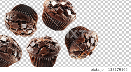 Multiple chocolate chip muffins scattered and isolated on white background, representing sweet dessert concept Multiple chocolate chip muffins scattered and isolated on white background, representing sweet dessert concept 138179163