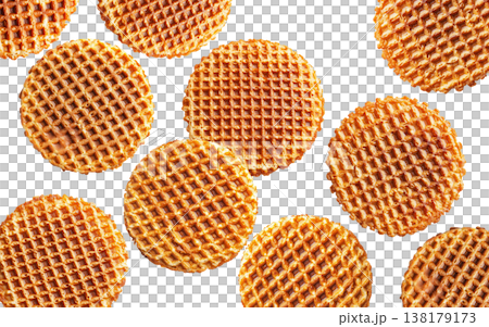 Multiple round caramel stroopwafels arranged in a scattered pattern from above, on a white background. Concept of sweet snacks 138179173