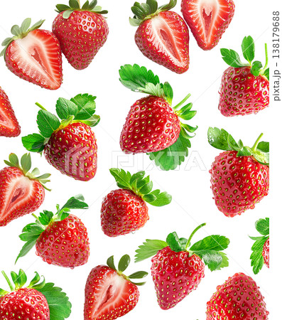 Juicy whole and halved strawberries with green leaves scattered and isolated on white background, freshness and healthy eating Juicy whole and halved strawberries with green leaves scattered and isolated on white background, freshness and healthy eating 138179688