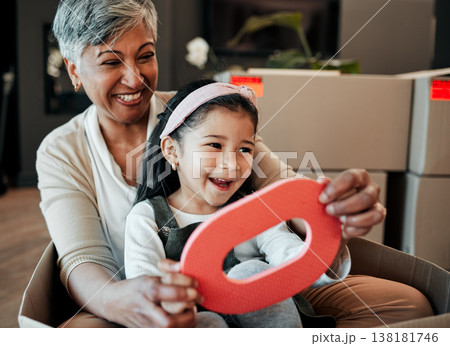 Senior woman, kid and moving boxes with smile, playing and happy with grandmother, grandchild or new property. Family home, excited and enjoying at house, driving and bonding for memories, fun or joy Senior woman, kid and moving boxes with smile, playing and happy with grandmother, grandchild or new property. Family home, excited and enjoying at house, driving and bonding for memories, fun or joy 138181746