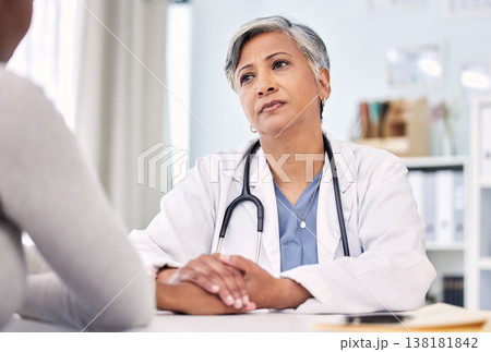 Medical, holding hands and doctor with woman in clinic for support. empathy or care. Checkup, discussion and closeup of female healthcare worker with sympathy for patient in medicare hospital. Medical, holding hands and doctor with woman in clinic for support. empathy or care. Checkup, discussion and closeup of female healthcare worker with sympathy for patient in medicare hospital. 138181842