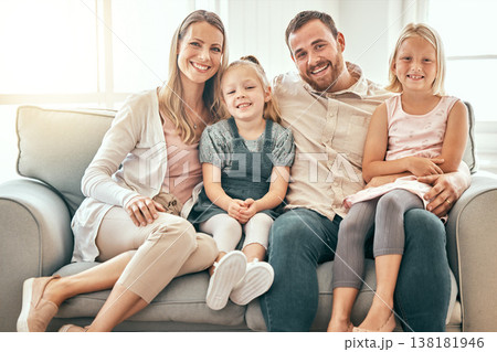 Happy, love and portrait of family on a sofa in the living room bonding and relaxing together at home. Happiness, Smile and girl children sitting with parents from Australia on floor in the lounge. Happy, love and portrait of family on a sofa in the living room bonding and relaxing together at home. Happiness, Smile and girl children sitting with parents from Australia on floor in the lounge. 138181946