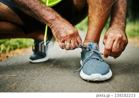 Man, tie and shoes in fitness for running, workout or outdoor exercise on road, street or asphalt. Closeup of male person, hands and tying shoe getting ready or preparation for sports, cardio or run 138182213