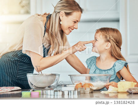 Mother and daughter, baking and smile for play in kitchen and love by bonding. Happy family, fresh ingredients and fun in learning, cake and dessert or pastry for breakfast, snacks and food at home Mother and daughter, baking and smile for play in kitchen and love by bonding. Happy family, fresh ingredients and fun in learning, cake and dessert or pastry for breakfast, snacks and food at home 138182428