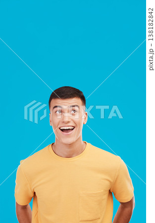 Man, face and customer with wow, surprised or open mouth expression in studio on blue background for sale. Fashion, emoji and person or guy on mock up space for deal or discount announcement or news Man, face and customer with wow, surprised or open mouth expression in studio on blue background for sale. Fashion, emoji and person or guy on mock up space for deal or discount announcement or news 138182842