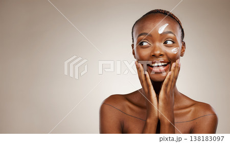 Beauty, smile and black woman with cream, thinking or dermatology on a grey studio background. African person, girl or model with creme, aesthetic or cosmetics with skincare mockup space or self care 138183097