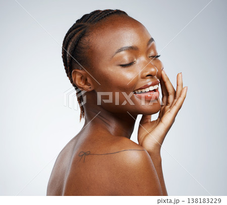 Happy black woman, natural skincare or wellness in studio with a smooth shine, smile or glow. Beauty, clean detox or confident African girl model with pride or dermatology results on white background Happy black woman, natural skincare or wellness in studio with a smooth shine, smile or glow. Beauty, clean detox or confident African girl model with pride or dermatology results on white background 138183229