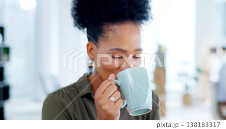 Black woman, drink and coffee break in office to relax in business, agency and company. Calm, employee and drinking cup of tea or espresso for energy, peace and motivation in professional workplace Black woman, drink and coffee break in office to relax in business, agency and company. Calm, employee and drinking cup of tea or espresso for energy, peace and motivation in professional workplace 138183317