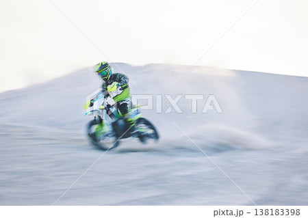 Blur, fast motorbike and man in desert for sports, action adventure or extreme travel on dirt on mockup space. Off road, sand and driver on motorcycle for speed in nature, competition race or freedom Blur, fast motorbike and man in desert for sports, action adventure or extreme travel on dirt on mockup space. Off road, sand and driver on motorcycle for speed in nature, competition race or freedom 138183398