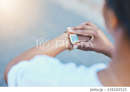 Closeup, woman and arm with watch for time management with elegance for business meeting in city. African person, entrepreneur and waiting by delay, check or late for transport to commute to client 138183523
