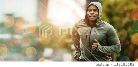 Fitness, bokeh and black man running outdoor, exercise or training healthy body in the morning in winter. Sport, cardio and African athlete workout, jog for wellness or energy for endurance in nature 138183592