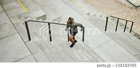 Fitness, city and black man running on stairs outdoor, exercise and training healthy body in urban town top view. Sports, cardio and African athlete on steps for workout, energy and jog for wellness Fitness, city and black man running on stairs outdoor, exercise and training healthy body in urban town top view. Sports, cardio and African athlete on steps for workout, energy and jog for wellness 138183595