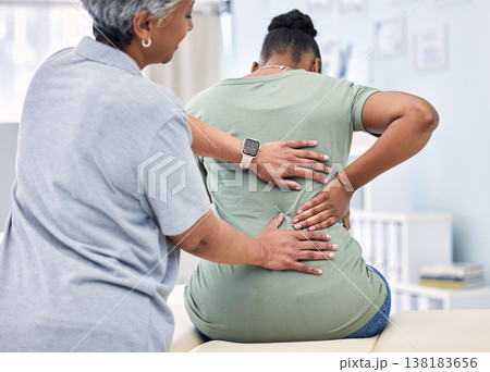 Back pain, physical therapy and chiropractor with patient, spine injury and healthcare with help and people at clinic. Physiotherapy, massage and anatomy with body, support and trust in health 138183656