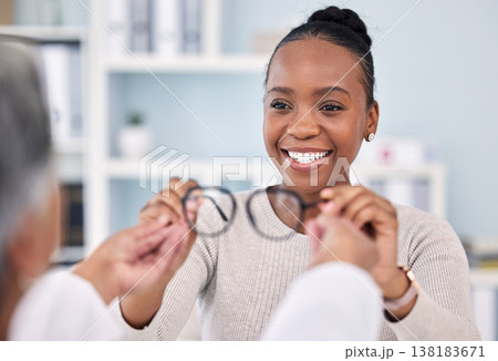 Eye care, glasses and black woman with optometrist at clinic, vision and healthcare with wellness and choice. Prescription lens, frame with help or advice, designer eyewear or spectacles with smile Eye care, glasses and black woman with optometrist at clinic, vision and healthcare with wellness and choice. Prescription lens, frame with help or advice, designer eyewear or spectacles with smile 138183671