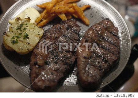 Meat Dish Ready to Eat on Rustic Plate 138183908