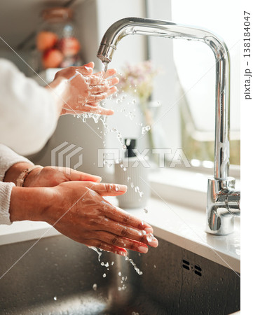 Hygiene, water and washing hands in a kitchen basin for health, cleaning and fresh before cooking. Morning, sustainability and a person with liquid for home sanitation, purity and routine in a sink 138184047