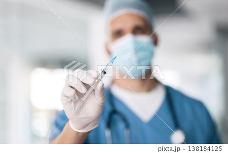 Man, doctor and hand with needle for vaccine, injection or antibiotic for healthcare or medical cure at hospital. Closeup of male person, nurse or surgeon with mask, gloves and flu shot at clinic Man, doctor and hand with needle for vaccine, injection or antibiotic for healthcare or medical cure at hospital. Closeup of male person, nurse or surgeon with mask, gloves and flu shot at clinic 138184125