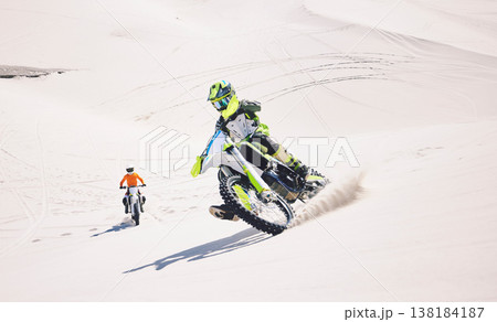 Motorcycle, desert sand and moto sport with people outdoor on hill with race, journey and adventure. Extreme, workout and motorbike challenge of biker with driving exercise and training in Dubai Motorcycle, desert sand and moto sport with people outdoor on hill with race, journey and adventure. Extreme, workout and motorbike challenge of biker with driving exercise and training in Dubai 138184187
