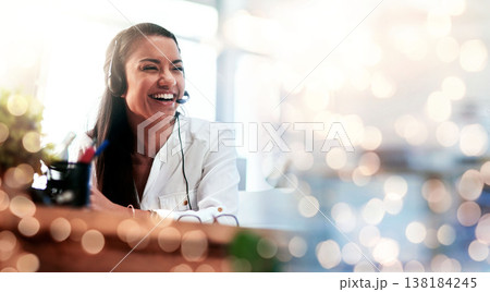 Happy woman, call center and laughing on bokeh background in customer service or telemarketing at office. Friendly female person, consultant or agent smile in online advice or funny joke at workplace Happy woman, call center and laughing on bokeh background in customer service or telemarketing at office. Friendly female person, consultant or agent smile in online advice or funny joke at workplace 138184245
