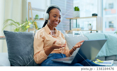 Black woman, laptop or video call on house sofa for networking, b2b customer deal or freelance business consulting. Smile, happy or talking employee on remote work technology or mobile communication Black woman, laptop or video call on house sofa for networking, b2b customer deal or freelance business consulting. Smile, happy or talking employee on remote work technology or mobile communication 138184476