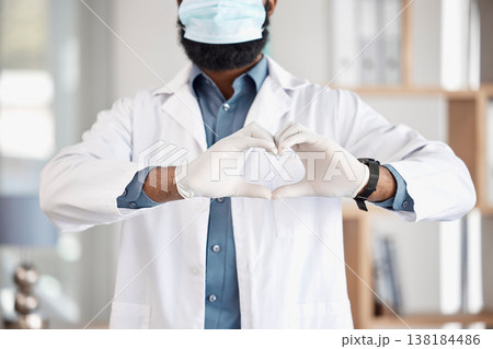 Doctor, hands and heart sign with mask for safety, healthcare and cardiology icon in hospital. Medic man, emoji and ppe gloves for wellness, kindness or medical support with review for clinic service Doctor, hands and heart sign with mask for safety, healthcare and cardiology icon in hospital. Medic man, emoji and ppe gloves for wellness, kindness or medical support with review for clinic service 138184486