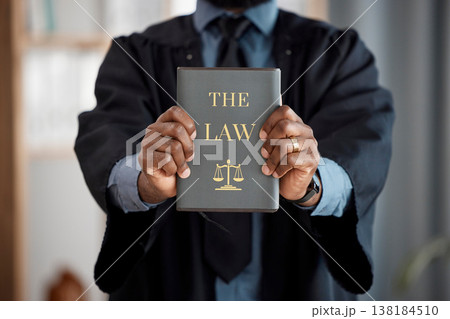 Hands, judge and law book for justice, knowledge and study constitution for decision in court. Legal expert, attorney or advocate and choice for equality, consultation and compliance for government 138184510