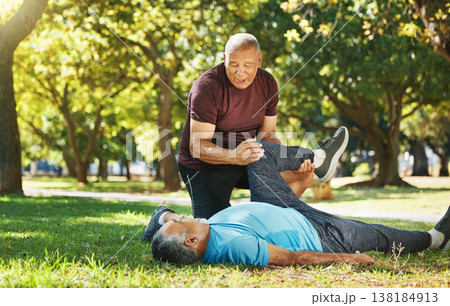 Stretching, park and men for fitness in retirement, support or help with exercise. Physiotherapy, training and senior coach with elderly athlete for warm up on the grass for sports or rehabilitation 138184913