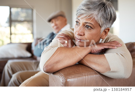 Divorce, stress and senior couple on a sofa fight, argue and angry at home together. Marriage, doubt and elderly woman thinking in living room with debt, fear or anxiety while ignoring toxic partner Divorce, stress and senior couple on a sofa fight, argue and angry at home together. Marriage, doubt and elderly woman thinking in living room with debt, fear or anxiety while ignoring toxic partner 138184957