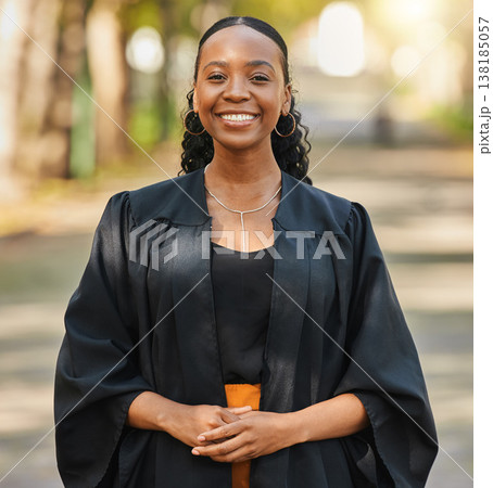 Portrait, graduate and happy black woman at university at campus outdoor. Face, graduation and smile of confident African student at college for education achievement, learning and success in Nigeria 138185057