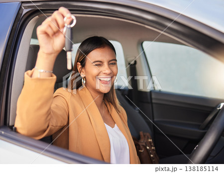 Portrait, car and woman with a key, smile and celebration with achievement, goals and success. Face, wink and happy girl with transportation, commute and new vehicle with travel, safety and road trip Portrait, car and woman with a key, smile and celebration with achievement, goals and success. Face, wink and happy girl with transportation, commute and new vehicle with travel, safety and road trip 138185114