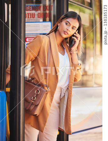 Business, woman or phone call at bus stop for travel or location with public transport for commute in urban city. Professional, corporate or person with smartphone and chat, talking or transportation Business, woman or phone call at bus stop for travel or location with public transport for commute in urban city. Professional, corporate or person with smartphone and chat, talking or transportation 138185173