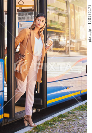 Business, woman or coffee at bus stop for travel or location with public transport for commute in urban city. Professional, corporate or person with beverage and sidewalk or street for transportation 138185175