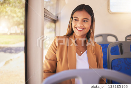 Young, woman and commute to work by bus, public transportation and city with traffic. Employee, alone and smile in happiness on face for career, occupation and traveling with service, metro or auto Young, woman and commute to work by bus, public transportation and city with traffic. Employee, alone and smile in happiness on face for career, occupation and traveling with service, metro or auto 138185196