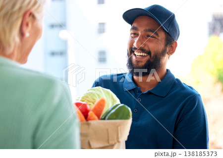 Delivery man, food and smile for customer, groceries and fresh produce from online shopping. Happy delivery man, supermarket discount and deal from supply chain, distribution with front door service. Delivery man, food and smile for customer, groceries and fresh produce from online shopping. Happy delivery man, supermarket discount and deal from supply chain, distribution with front door service. 138185373