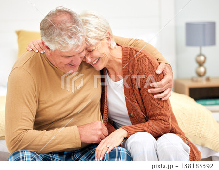 Funny, hug or happy senior couple with love, care or joy together on sofa at home in retirement. Relax, silly joke or mature people laughing with support, humor or loyalty on house living room couch Funny, hug or happy senior couple with love, care or joy together on sofa at home in retirement. Relax, silly joke or mature people laughing with support, humor or loyalty on house living room couch 138185392