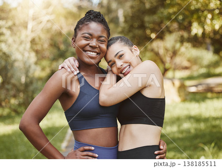 Fitness, happy and portrait of friends in a forest after workout, exercise and outdoor training together with support and care. smile, nature and women hug in morning ready for wellness teamwork 138185511