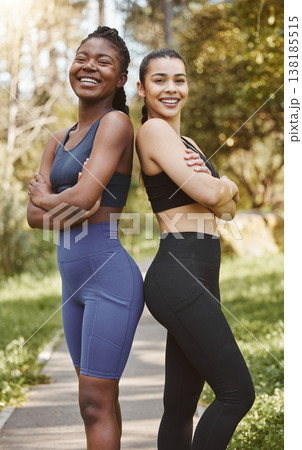 Fitness, friends and portrait of women in park for running exercise for race or marathon training. Sport, workout and female athletes with crossed arms for cardio wellness together outdoor in nature Fitness, friends and portrait of women in park for running exercise for race or marathon training. Sport, workout and female athletes with crossed arms for cardio wellness together outdoor in nature 138185515
