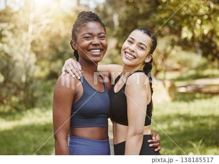 Fitness, smile and portrait of friends in a forest after workout, exercise and outdoor training together with support and care. Happy, nature and women hug in morning ready for wellness teamwork 138185517