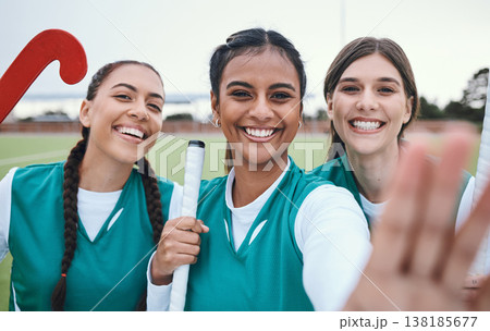 Selfie, portrait and woman with team for hockey match, sports day and training together for exercise, smile and happiness. Workout, sports uniform and hockey stick to play, fitness and cardio health Selfie, portrait and woman with team for hockey match, sports day and training together for exercise, smile and happiness. Workout, sports uniform and hockey stick to play, fitness and cardio health 138185677