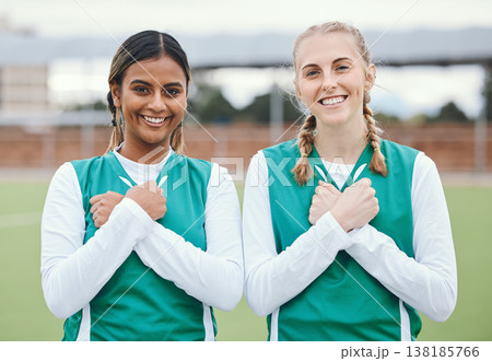 Crossed arms, sports and portrait of friends for hockey on field for training, exercise and workout. Fitness, team and happy women with hand gesture on chest for teamwork, support and bonding in club 138185766