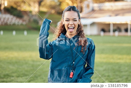 Woman, sport celebration and winner portrait with excited coach on a field for game and workout. Training, yes and fitness performance success of person with winning and achievement from exercise 138185796