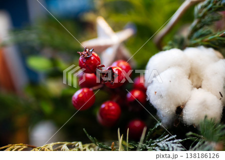 Holiday festive decoration. Rustic holiday decor with natural textures and greenery Holiday festive decoration. Rustic holiday decor with natural textures and greenery 138186126