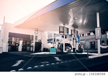 Gas station, cars and fuel for travel or transportation, auto stop and diesel service. Morning, road and and an area for gasoline for transport, oil change or a store for traveling inspection 138186508